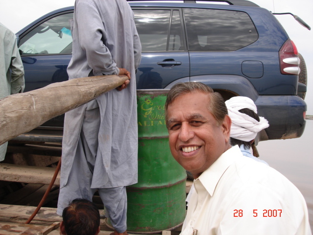 Me (A.K.Khadim) crossing the river in boat along with jeep