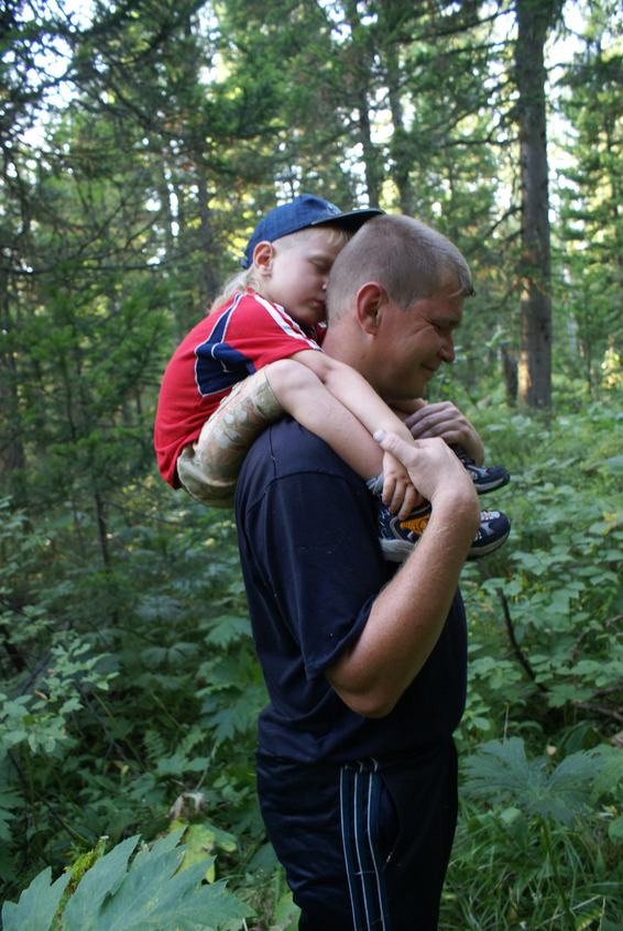 Edik rides on his father's neck