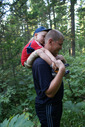 #7: Edik rides on his father's neck