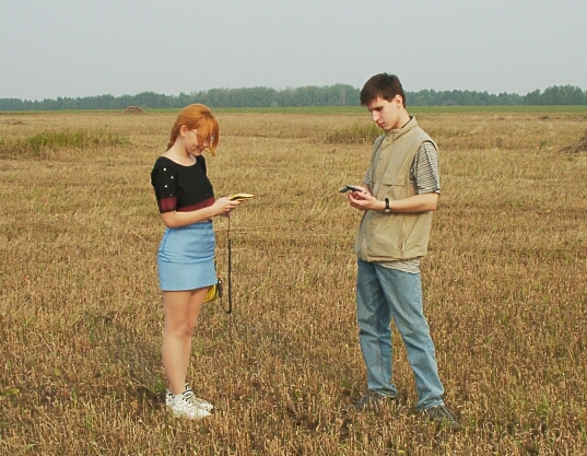 Son and daughter with GPS navigators