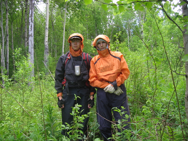 The confluence conquerors (from left: Ilia Yablonko and Artem Sismekov). We are wrapped up in anoraks against throngs of mosquitos