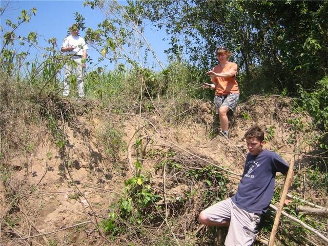 Climbing down the river bank