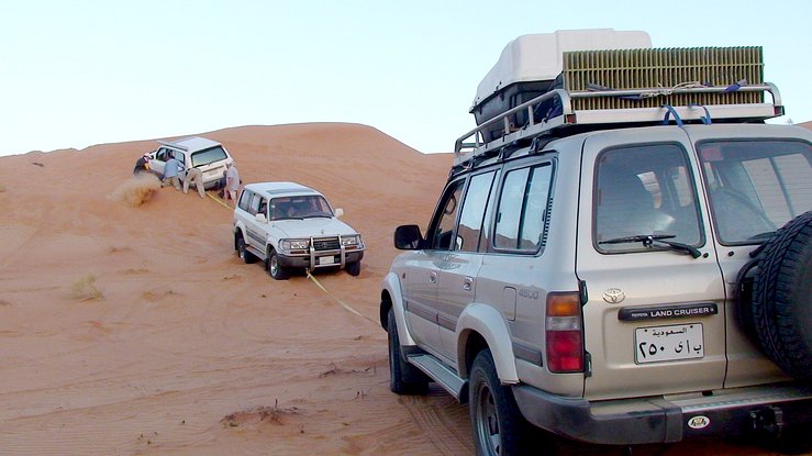 Recovery of landcruiser with the beads popped-off two downslope tires