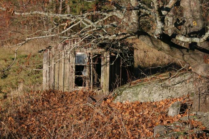 Wrecked shed at closest road junction