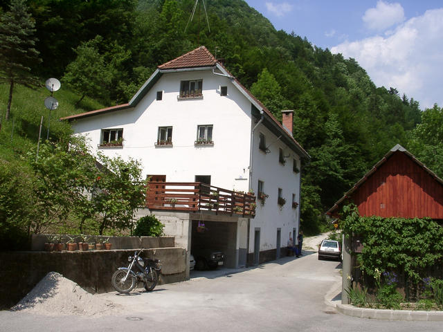 The house where we reached the street after climbing down. The confluence point is on the slope just behind this house.