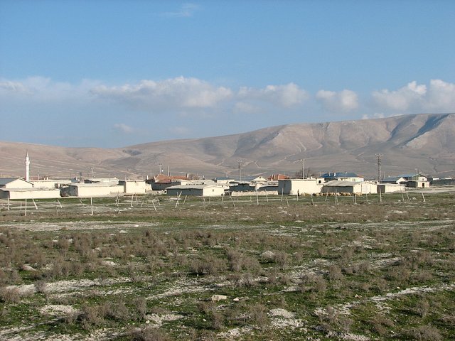 Divanlar at the foot of the mountains the Confluence is situated on. The track into the mountains can be seen faintly in the picture's background