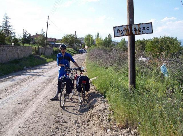 I guess we were almost covered with dust for a picture taken at 120th km...