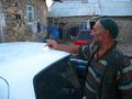 #9: Farmer signing our car