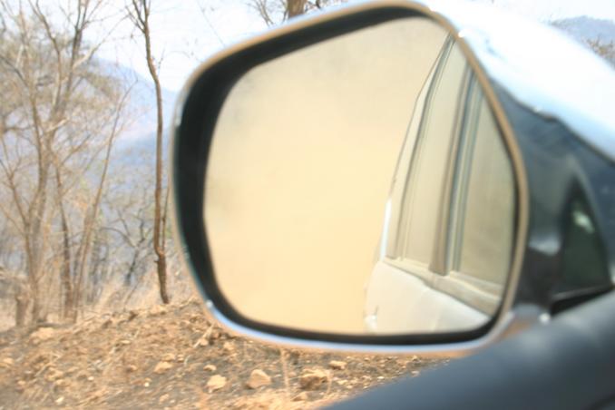 A view behind us: a wall of dust