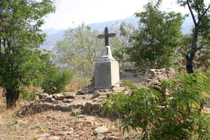 The cross possibly indicates the site of a former church