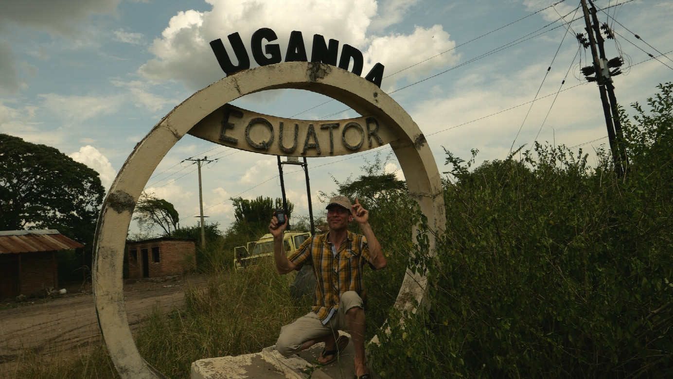 Eqator monument with visitor