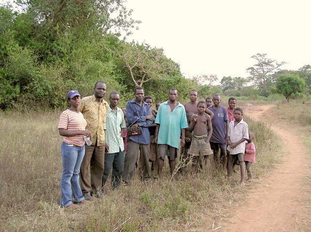 From left to right: Stella, Henry, our guide, everyone from the local compound.