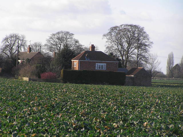 Nearest house to the confluence--a few hundred meters west.