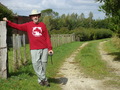 #9: Confluence approach road beside the Village Hall