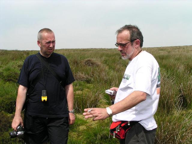 Gordon and Captain Peter discussing about the exact location