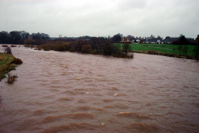 West towards the CP, river is 30feet up on normal