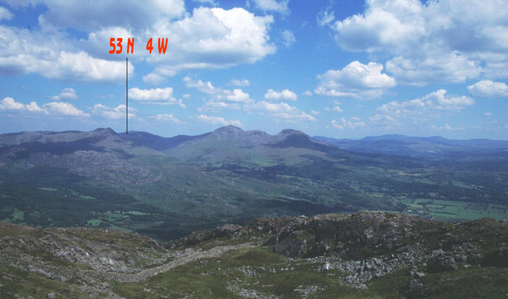 A view from about 10 Km to the South West. The picture shows the plateau between Cnicht and Moelwyn Mawr, and I have marked the spot.