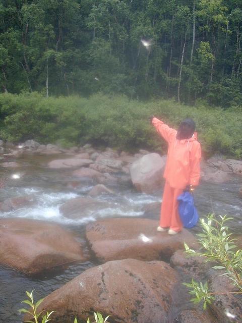 Bill pointing to the confluence (note the 6 sparrow sized mosquitoes)