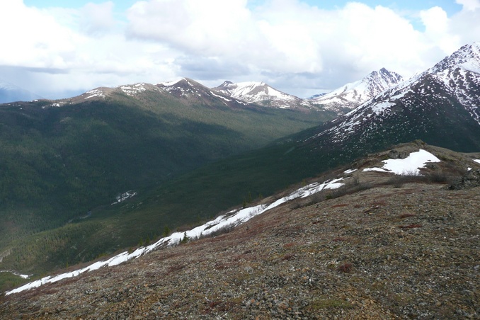 The confluence site is on the shadowed hillside across the valley in the left center of the photo.