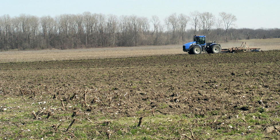 A farmer tills the fields of historic Island Number Seventy.