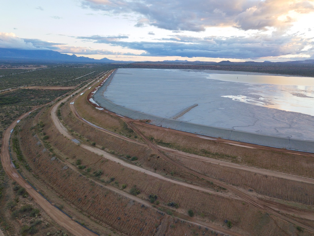 View South (across a large reclamation pond, filled with mine tailings) from 120 m above the point