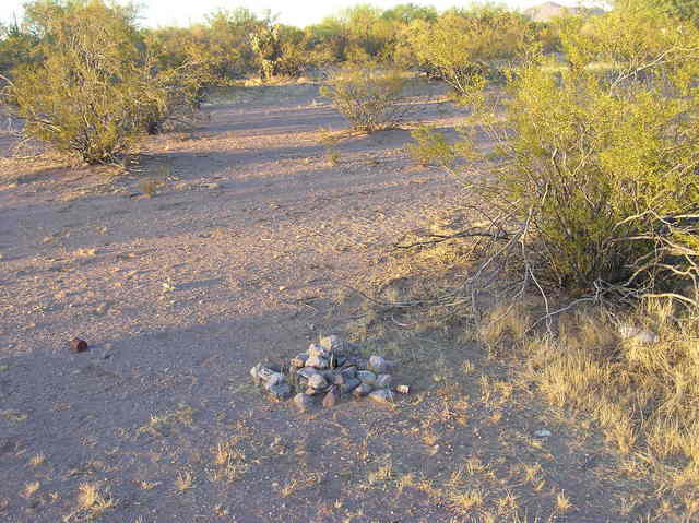 The confluence point (just beyond this rock cairn)