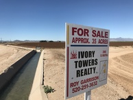 #8: View of the entrance to the confluence field, showing that the field is for sale.