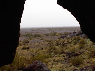 #1: Hiking in.  Watching the rain from inside a small lava cave