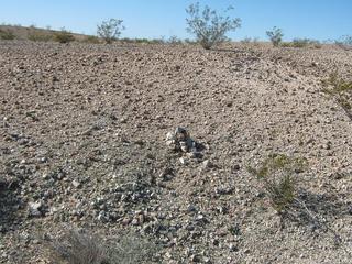 #1: West view and the cairn erected by previous visitors