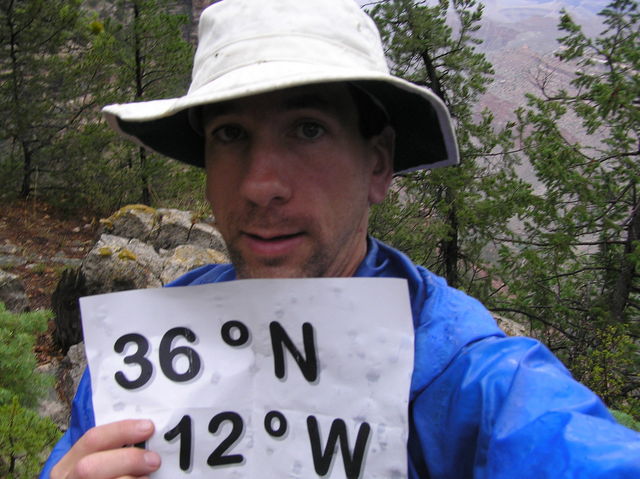 Joseph Kerski, in the rain and dismayed by the cliff preventing access to 36 North 112 West.