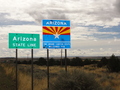 #7: Uzona state line road sign