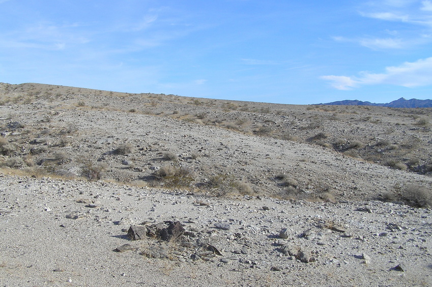 View to the southeast at the site of 34 North 115 West.  The confluence lies in the center of the picture between the two ravines.