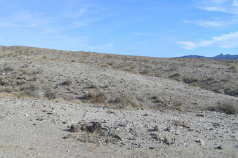 #1: View to the southeast at the site of 34 North 115 West.  The confluence lies in the center of the picture between the two ravines.