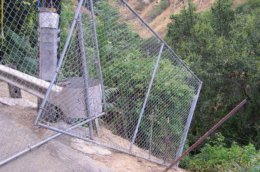 Fence barring entry to the grounds around 34 North 118 West.