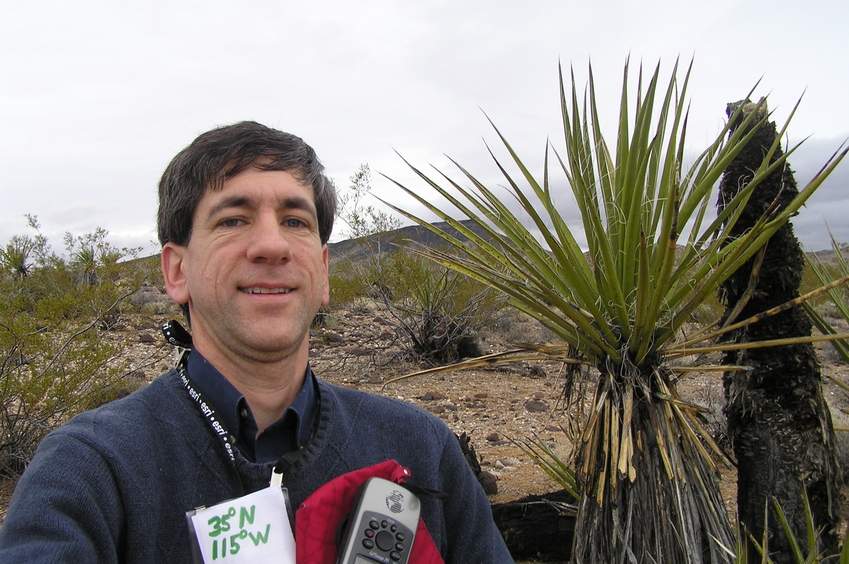 Joseph Kerski at the confluence point. 