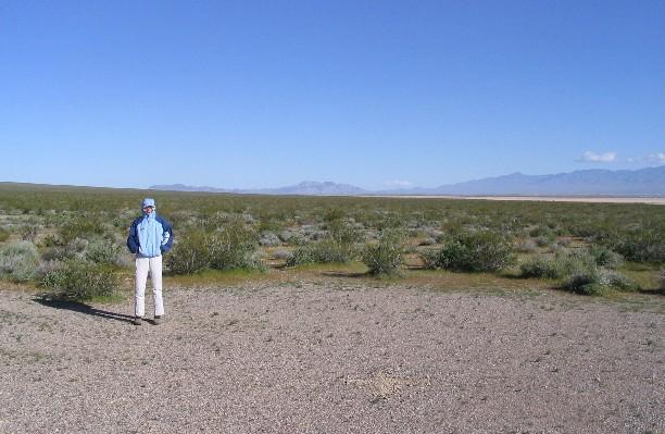 Looking due north.  Beth wards off the wind.