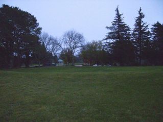 #1: View to the east at 87 meters from CP - some golf club house facilities can be seen from here