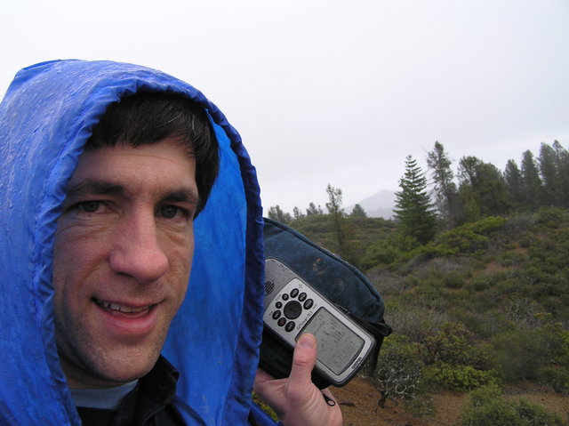 Joseph Kerski standing in the rain at 39 North 123 West.