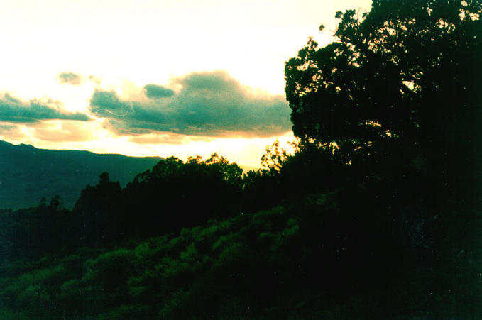 West into the setting sun. Adams Peak at left