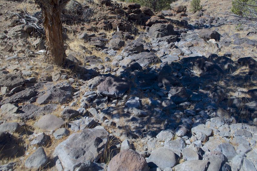 The confluence point lies within a rocky creek bed - currently dry