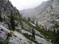 #3: Looking West with Sapphire Lake just visible in center.  Clouds and mist coming over Sawtooth Ridge