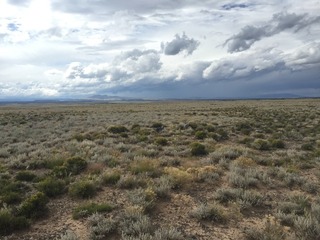 #1: View of 37 North 106 West, in the foreground, looking northwest. 