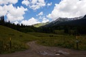 #8: Looking up towards the Degree Confluence Point from Gothic Road, about 1 mile away. (The point is near the center of this photo.)