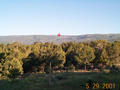 #7: A view of the confluence from our deck. The red arrow is the approximate location 6.68 miles northwest.