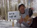 #2: Joseph Kerski lying in the snow at the confluence site.