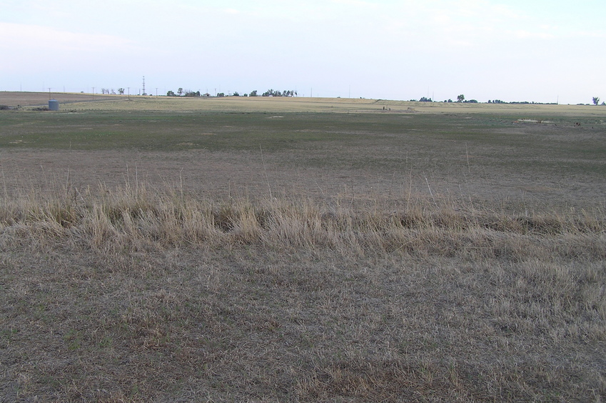 The site of 40 North 105 West in the foreground, looking south.