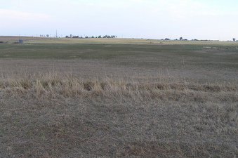 #1: The site of 40 North 105 West in the foreground, looking south.