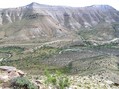 #8: View of Cottonwood Canyon to the east showing the vehicle along the road far below.