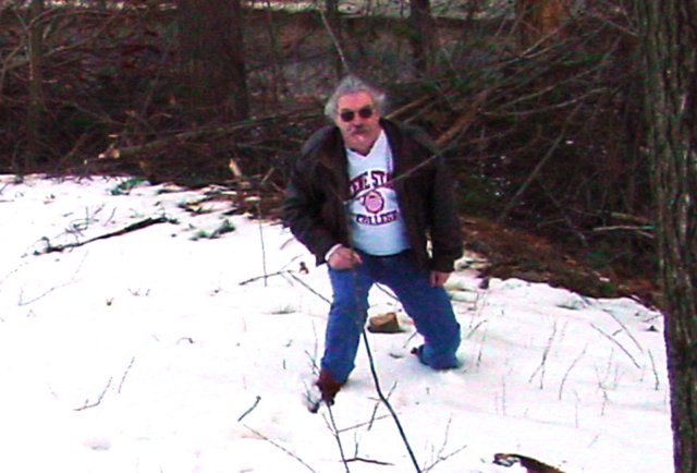 Bert, struggling up the hill to the site.