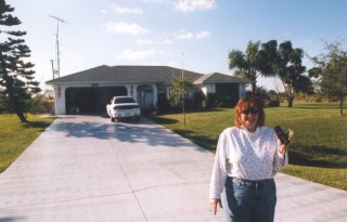 #1: Deb in front of the confluence house!